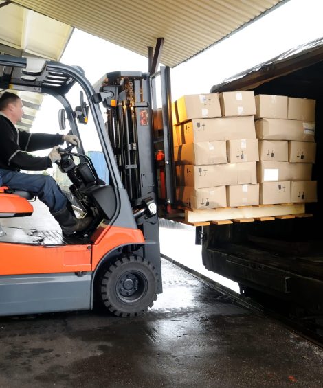 bigstock-Electric-forklift-in-warehouse-18986495